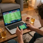 TIP88 user placing bets on smartphone during exhilarating sports betting session at home