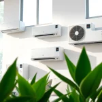 Mitsubishi mini split AC units elegantly installed in a stylish living room with bright natural lighting.
